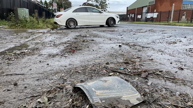 Aftermath of flooding on Ashford Road, Milperra, on July 5, 2022. Picture: Paul Brescia