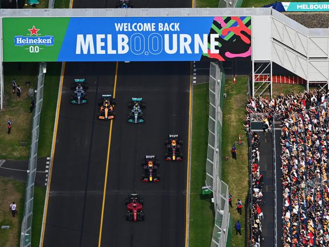 An aerial view shows Charles Leclerc, Max Verstappen, Sergio Perez, Lewis Hamilton, Lando Norris and George Russell at the start of the 2022 Grand Prix. Picture: Clive Mason/Getty Images