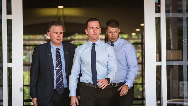 Constable Zachary Rolfe, flanked by supporters attends the Supreme Court of the Northern Territory. Picture: Glenn Campbell