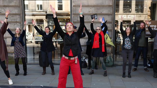 Activists from Extinction Rebellion dance as they demonstrate outside Abrdn's AGM in Edinburgh, Scotland. Picture: Getty Images