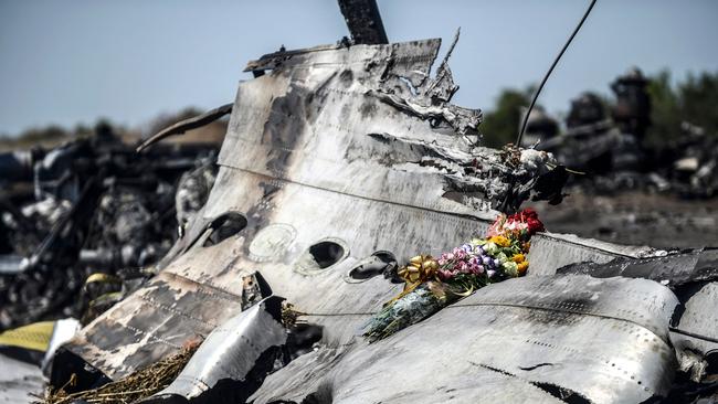 Flowers left by parents of an Australian victim of the MH17 crash near the village of Hrabove in the Donetsk region. Picture: AFP.
