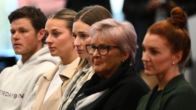 The Hardwick clan and Alexandra Crow (far right) attend the press conference. Photo by Quinn Rooney/Getty Images)