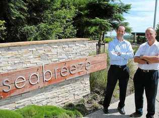 Dale Scotcher and Lance Cotterill are amazed at the quick sales at Seabreeze estate at Pottsville.