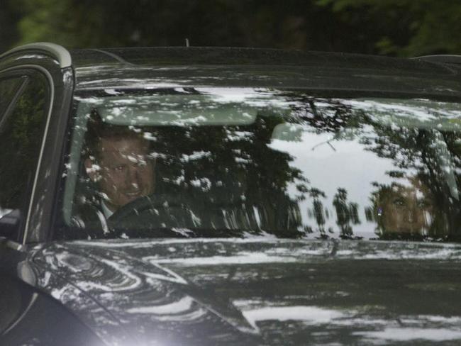 Prince Harry in an Audi drives his girlfriend, Meghan, to the wedding reception of Pippa Middleton and her husband James Matthews. Picture: News Group Newspapers Ltd.