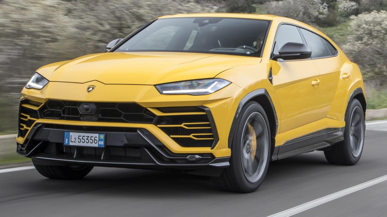 Сколько весит lamborghini urus