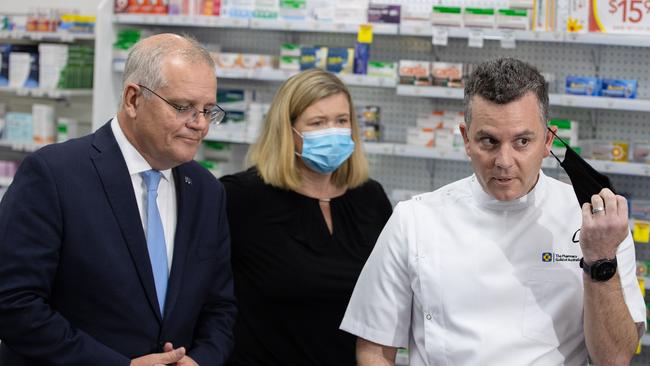 Prime Minister Scott Morrison, MP Bridget Archer and Pharmacy Guild of Australia president Trent Twomey. Picture: Jason Edwards