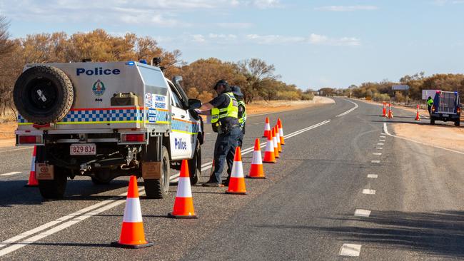 NT Police man the Northern Territory/South Australian border on March 24 in preparation for the Territory’s border restrictions to come into force. Picture: Emma Murray