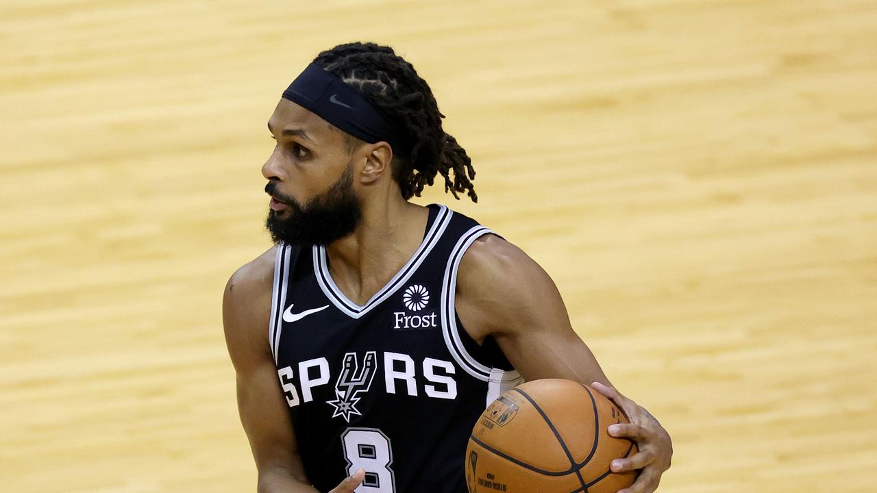 Australian coach Brian Goorjian isn’t surprised and can only smile when he sees Patty Mills unleash “Boomers Patty” on the NBA. Picture: Carmen Mandato/Getty Images/AFP.