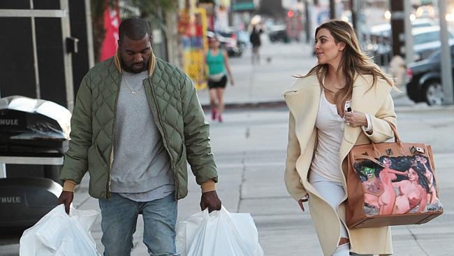 Kim flaunted her new tote while shopping in LA with Kanye. Picture: Splash News