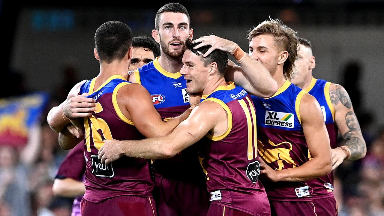 Daniel McStay is congratulated by teammates after kicking a goal. Picture: Getty Images