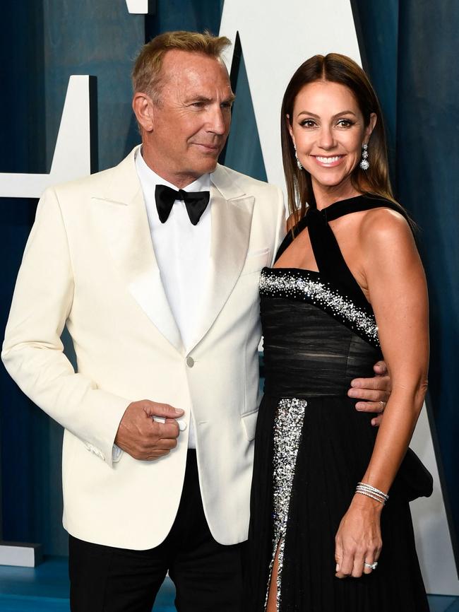 Kevin Costner and ex-wife Christine Baumgartner, who has moved out of the actor’s house but still lives on the same property in a smaller house. Picture: AFP/Getty Images