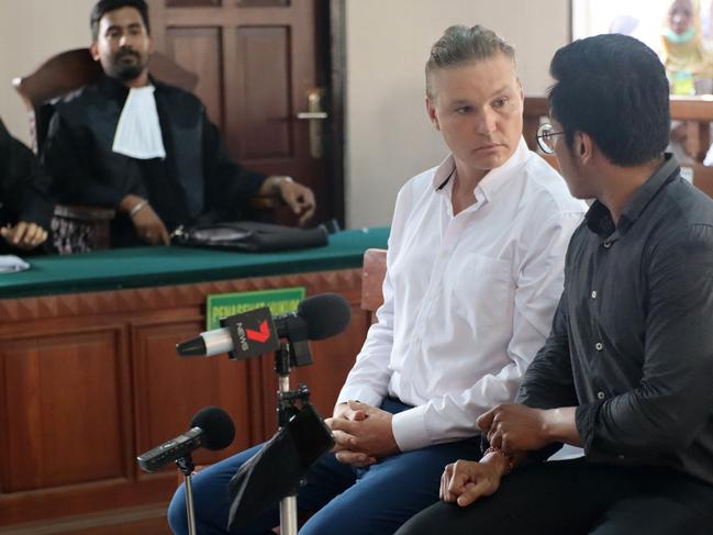 David Van Iersel speaks to Ririn Wijayanti, one of the doctors who treated him at a Bali hospital. Picture: Lukman S.Bintoro