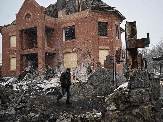 A man walks between houses destroyed during air strikes on the central Ukranian city of Bila Tserkva. Picture: AFP