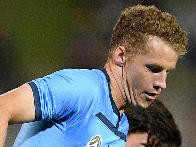 Trent Buhagiar of Sydney is tackled by Dylan Ruiz-Diaz of the Mariners during the Round 10 A-League match between the Sydney FC and the Central Coast Mariners at Netstrata Jubilee Stadium in Sydney, Saturday, December 14, 2019. (AAP Image/Dan Himbrechts) NO ARCHIVING, EDITORIAL USE ONLY