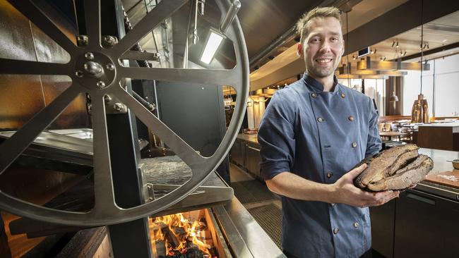 Longhorn Smokehouse Head Chef John Churchill with a 16hr Smoked Cape Grim Brisket (MB4+) at Wrest Point. Picture: Chris Kidd