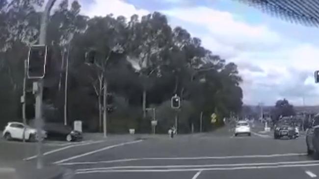 Dashcam captured the moment before the pair were struck. The woman and child were taken to hospital. Picture: Supplied / 9 News