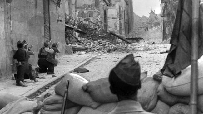 Republicans battling for the Alcazar in Toledo during the Spanish Civil War. Picture: AFP