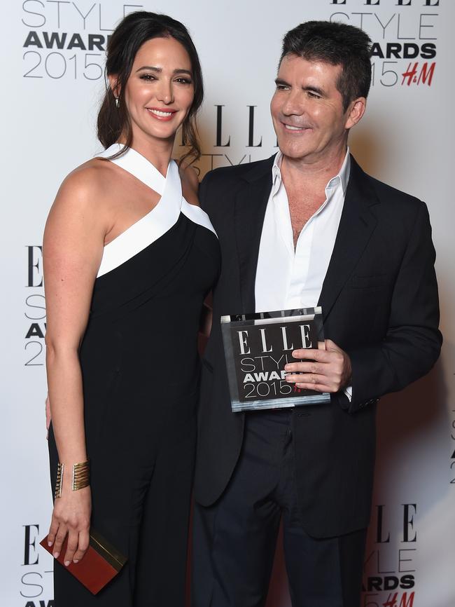 Simon Cowell and Lauren Silverman with his Outstanding Contribution to Entertainment award.