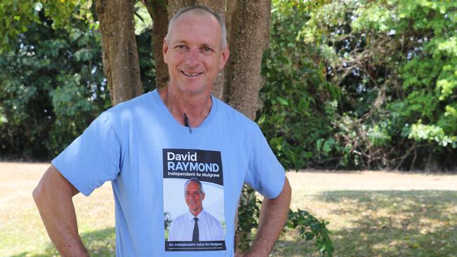 Mulgrave independent, David Raymond, while campaigning at an early voting centre in Woree on Friday.