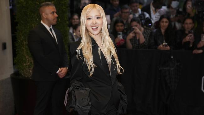 BLACKPINK’s Rose seen departing for the Met Gala in an all-black Saint Laurent suit and cape. Picture: Getty