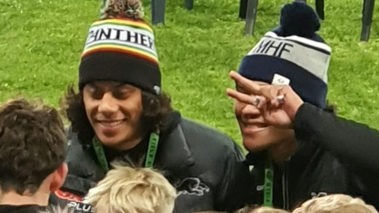 Good deed: Penrith stars Jarome Luai and Brian To'o sign autographs for young Cronulla fans.