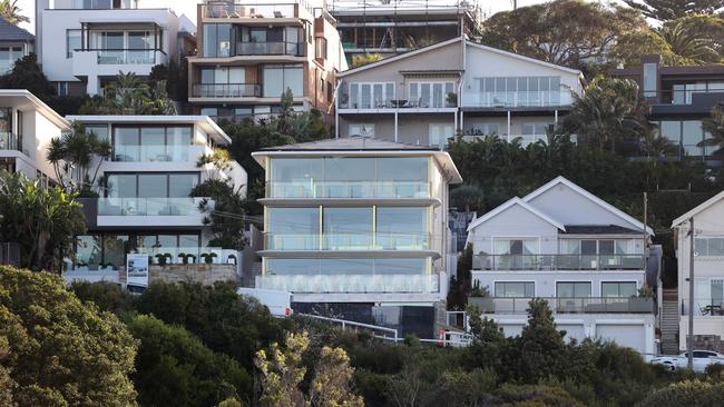 The gold and marbled home stands out along the Sydney Eastern Suburbs coastline. Picture: Richard Dobson