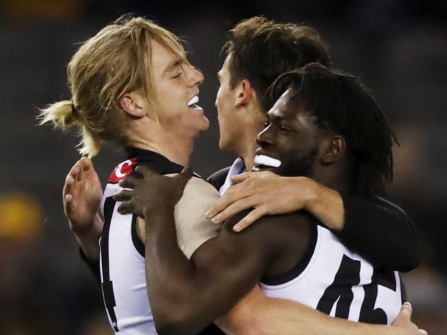 MELBOURNE, AUSTRALIA - JULY 03: Martin Frederick of the Power celebrates a goal with Miles Bergman of the Power during the 2021 AFL Round 16 match between the Hawthorn Hawks and the Port Adelaide Power at Marvel Stadium on July 3, 2021 in Melbourne, Australia. (Photo by Dylan Burns/AFL Photos via Getty Images)