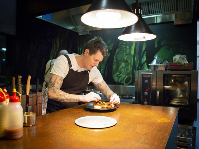 Chef Ben Milbourne. in action in the kitchen