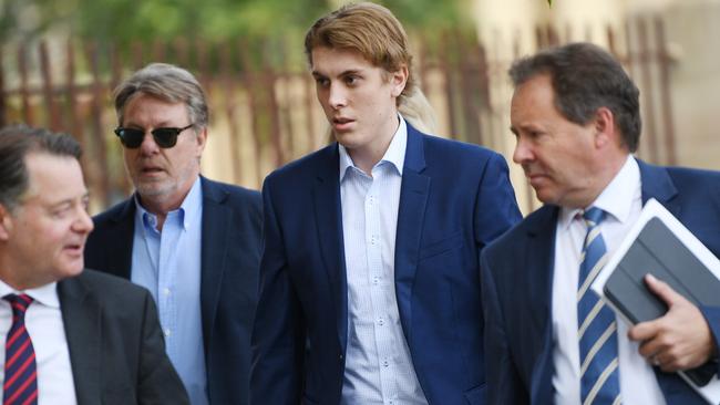 Harrison Kitt, centre, outside Adelaide Magistrates Court. He is charged with killing Detective Chief Superintendent Joanne Shanahan and mother Tania McNeill in an Urrbrae crash in April. Picture: NCA NewsWire / David Mariuz