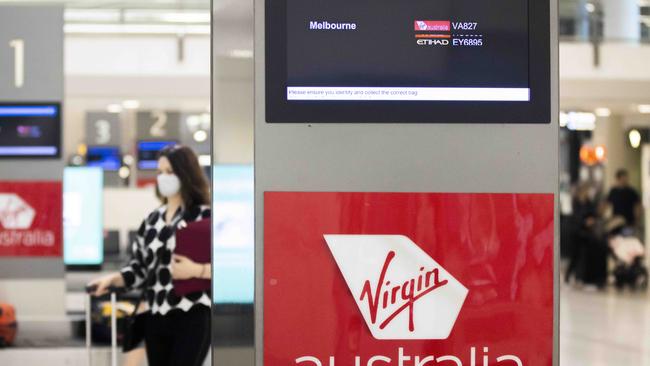 The baggage pick up area for Virgin Australia flight 827 from Melbourne at Sydney Airport on Saturday. Picture: NCA NewsWire / Jenny Evans