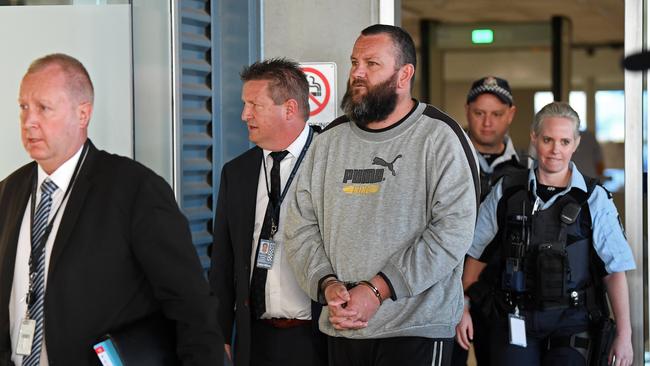 Steven Hainsworth arriving at Adelaide Airport after being extradited from Melbourne in May 2019. Picture: Tom Huntley