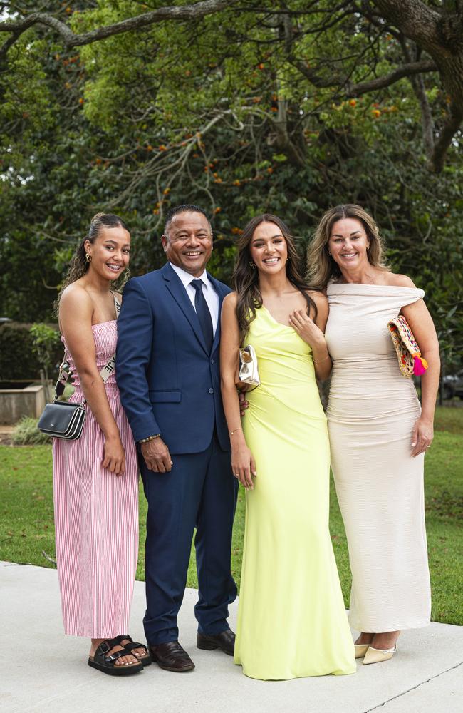 Graduate Liliana Sing with sister Ruby and parents Keni and Sarah Sing as Downlands College year 12 students come together for their valedictory mass at the college, Saturday, November 16, 2024. Picture: Kevin Farmer