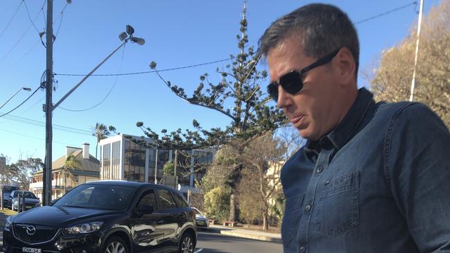 Former Surf Life Saving NSW boss Matthew Hanks leaves Wollongong police station today. Picture: Madeline Crittenden