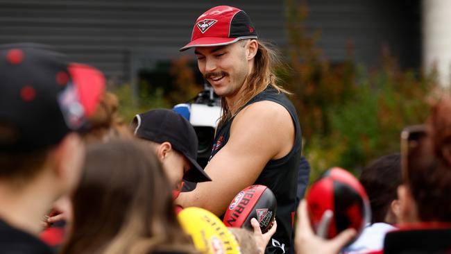 Sam Draper chatting with Bombers fans this pre-season. Picture: Michael Willson/AFL Photos via Getty Images