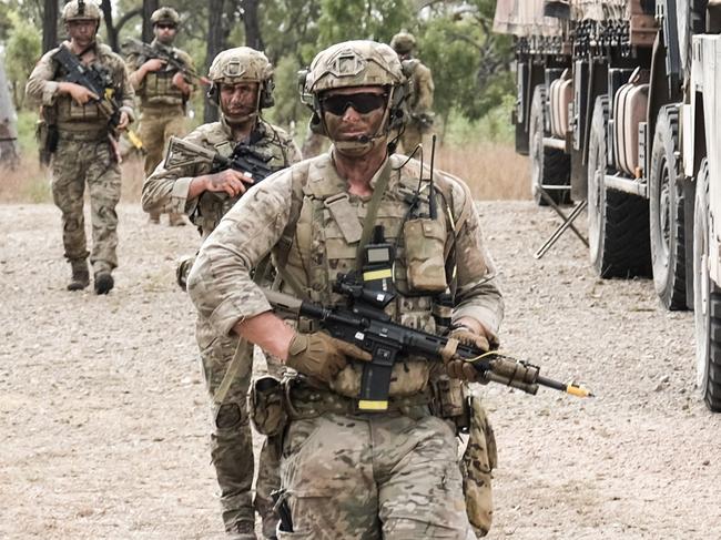 40 Commando, Royal Marines and 2nd Battalion, Royal Australian Regiment conduct integration training  at Townsville Field Training Area in preparation for Exercise Talisman Sabre 23. *** Local Caption *** Exercise Talisman Sabre 2023 is being conducted across northern Australia from 22 July to 4 August.  More than 30,000 military personnel from 13 nations will directly participate in Talisman Sabre 2023, primarily in Queensland but also in Western Australia, the Northern Territory and New South Wales.Â    Talisman Sabre is the largest Australia-US bilaterally planned, multilaterally conducted exercise and a key opportunity to work with likeminded partners from across the region and around the world.  Fiji, France, Indonesia, Japan, Republic of Korea, New Zealand, Papua New Guinea, Tonga, the United Kingdom, Canada and Germany are all participating in Talisman Sabre 2023 with the Philippines, Singapore and Thailand attending as observers.  Occurring every two years, Talisman Sabre reflects the closeness of our alliance and strength of our enduring military relationship with the United States and also our commitment to working with likeminded partners in the region.  Now in its tenth iteration, Talisman Sabre provides an opportunity to exercise our combined capabilities to conduct high-end, multi-domain warfare, to build and affirm our military-to-military ties and interoperability, and strengthen our strategic partnerships.
