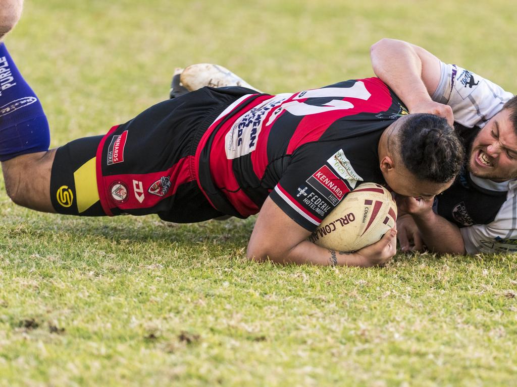 Valleys player Tevita Cocker (left) is tackled by Nicholas Ferris of Oakey in TRL A grade round 10 rugby league at Herb Steinohrt Oval, Sunday, June 20, 2021. Picture: Kevin Farmer