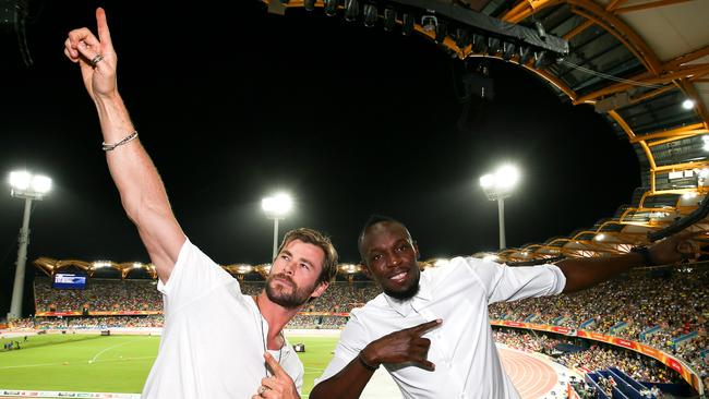 NO ONLINE UNTIL MIDNIGHT GOLD COAST, AUSTRALIA - APRIL 12:  Usain Bolt and Chris Hemsworth on day eight of the 2018 Gold Coast Commonwealth Games on at Carrara Stadium April 12, 2018 in Gold Coast, Australia.  (Photo by Hagen Hopkins/Getty Images for GOLDOC)