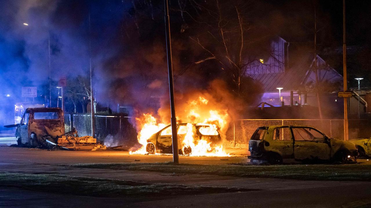 A burning car near Rosengard in Malmo. Picture: AFP.