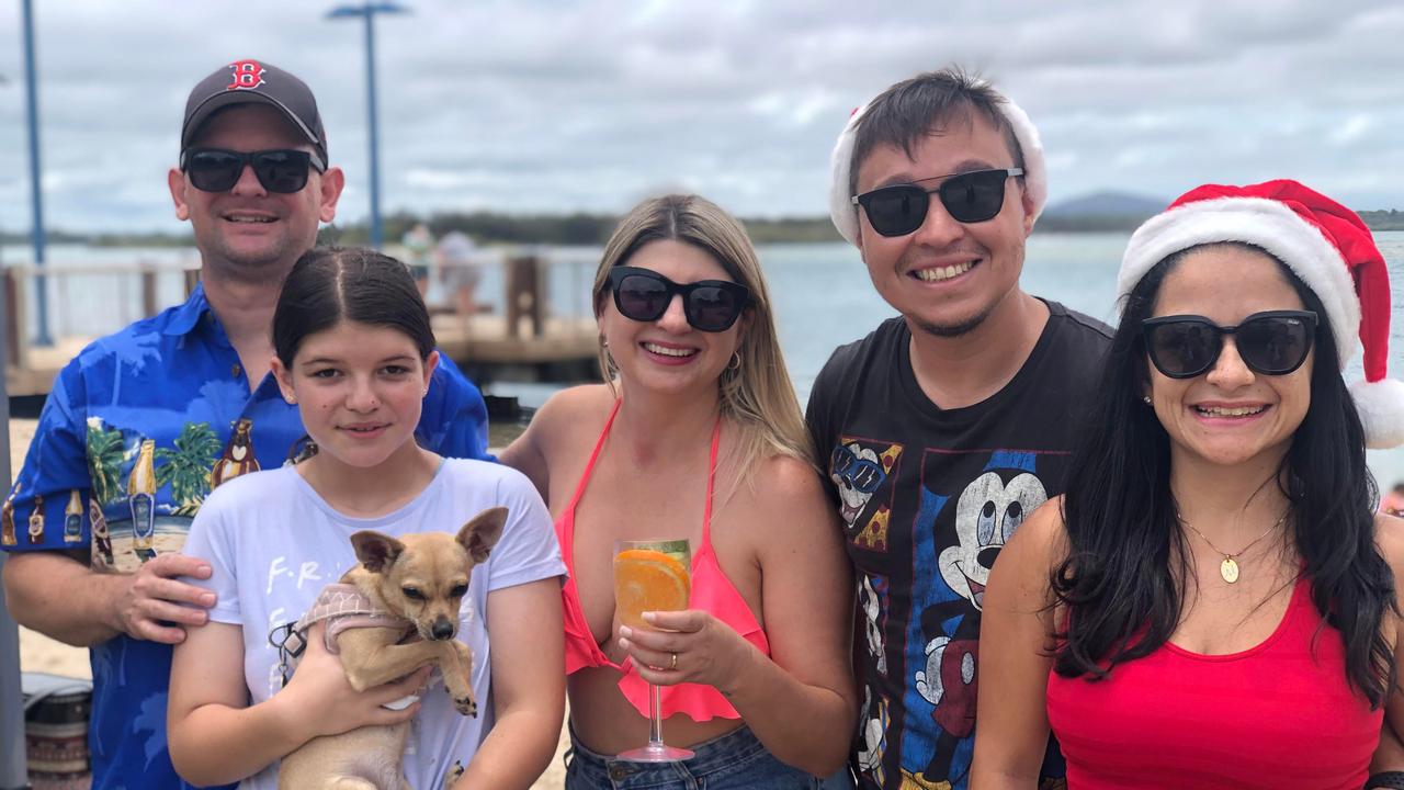 Maicon, Nicole and Tania Sapelli enjoy Christmas celebrations with Racardo and Mariana Muller (right) at Cotton Tree Park. Picture: Laura Pettigrew.