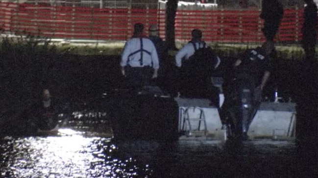 A man allegedly hide from police in Albert Park Lake after slashing a man with a knife on a bus. Picture: 9News Melbourne