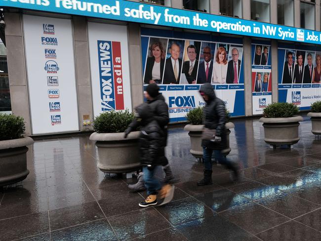 NEW YORK, NEW YORK - FEBRUARY 04: People walk past 1211 Avenue of the Americas the headquarters for News Corp on February 04, 2022 in New York City. The global media company and owner of Fox News and The New York Post announced that in January it suffered a cyberattack which it believes China was behind. The company said that hackers targeted an IT provider which resulted in the theft of unspecified data.   Spencer Platt/Getty Images/AFP == FOR NEWSPAPERS, INTERNET, TELCOS & TELEVISION USE ONLY ==