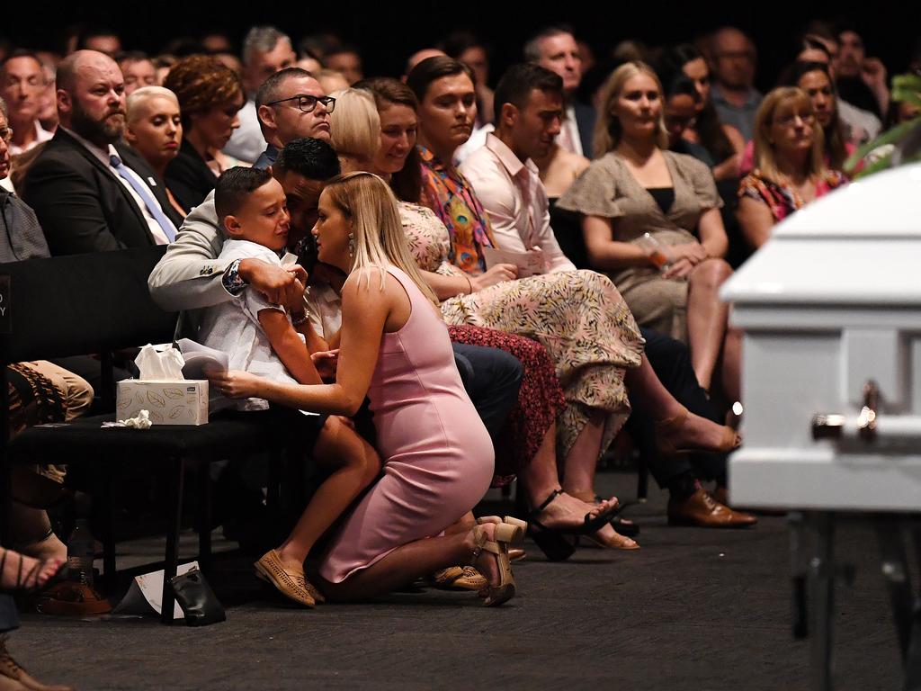 Hannah Clarke's friend Nikki Brooks comforts her son during the funeral for Hannah and her three children Aaliyah, Laianah and Trey in Brisbane. Picture: Dan Peled/AAP