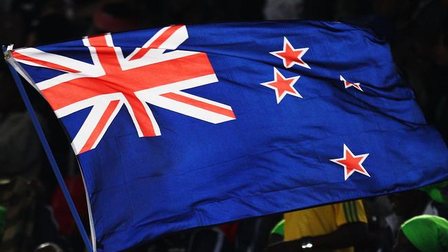 POLOKWANE, SOUTH AFRICA - JUNE 24:  A New Zealand flag waves her national flag during the 2010 FIFA World Cup South Africa Group F match between Paraguay and New Zealand at Peter Mokaba Stadium on June 24, 2010 in Polokwane, South Africa.  (Photo by Cameron Spencer/Getty Images)