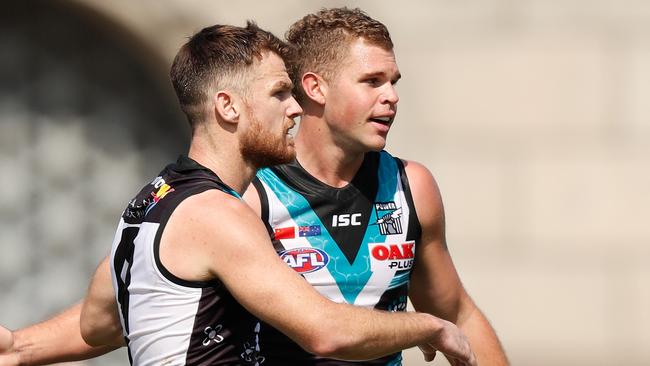 Dan Houston, pictured with Robbie Gray, could be the Power’s next midfield bolter. Picture: Michael Willson/AFL Photos