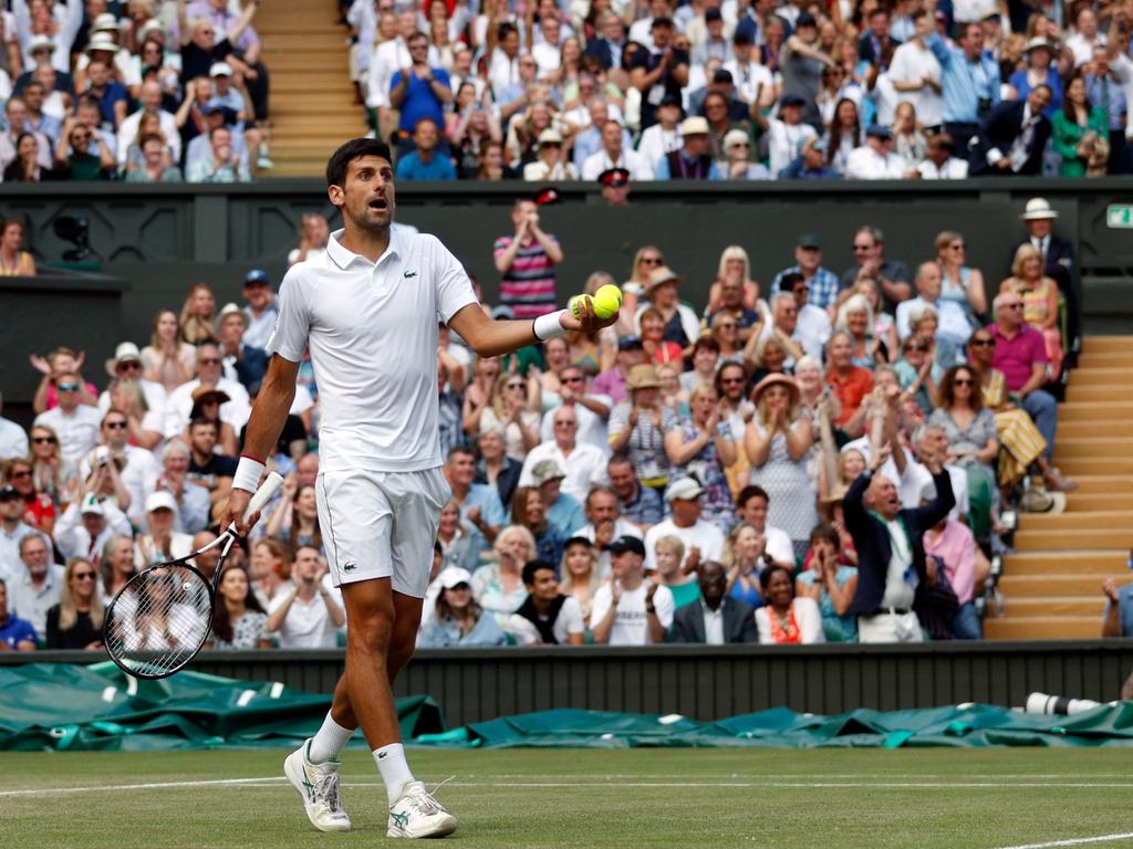 Serbia's Novak Djokovic protests. (Photo by Adrian DENNIS / POOL / AFP)