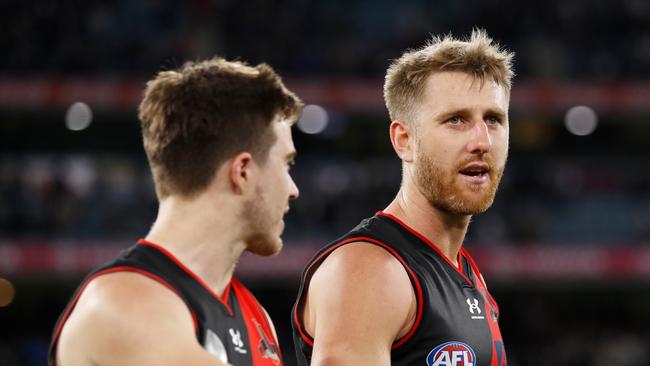 Dyson Heppell and Zach Merrett after the loss to Collingwood (Photo by Dylan Burns/AFL Photos via Getty Images)