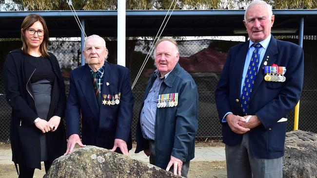 Liz Ronson from PEET with Anzac day vetran, Bert Foster, Neville Young and John Lynch at the present war memorial at the Craigieburn SES headquarters