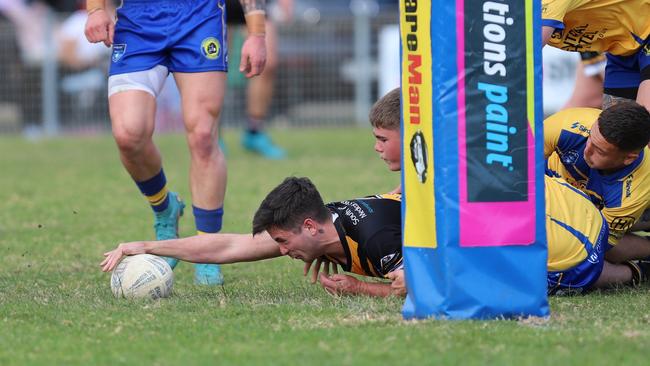 Jets winger Beau Luland reaches out to score. Picture: Steve Montgomery/Ourfootyteam