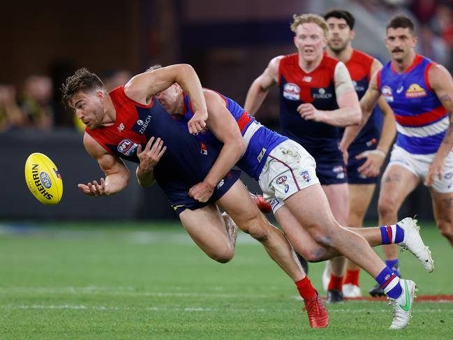 Jack Viney is tackled by Jack Macrae. Picture: Michael Willson/AFL Photos via Getty Images