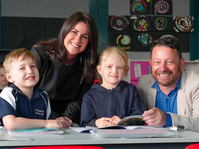 Education Minister Jo Palmer, with Goulburn St Primary School principal Michael Park, and students Luca and Sybella.